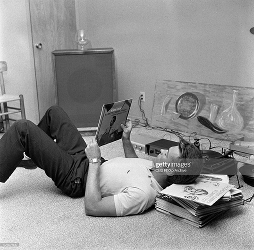 American actor Clint Eastwood listens to records at his home, October 1, 1959. (Photo by CBS Photo ArchiveGetty Images)