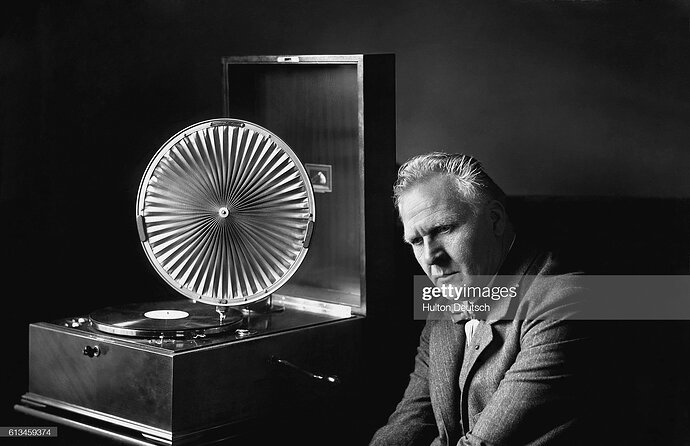 (Original Caption) The Russian opera singer Feodor Chaliapine listening to a gramophone in the 1920s. (Photo by © Hulton-Deutsch Collection:CORBIS:Corbis via Getty Images)