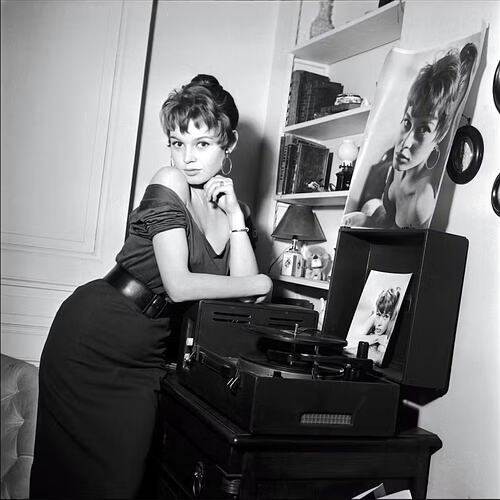 Brigitte Bardot at home in Paris, 1952. (Photo by QUINIO/Gamma-Rapho via Getty Images)
